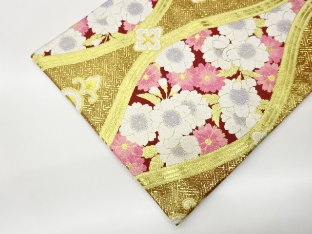  立涌に華紋・桜模様織出し袋帯